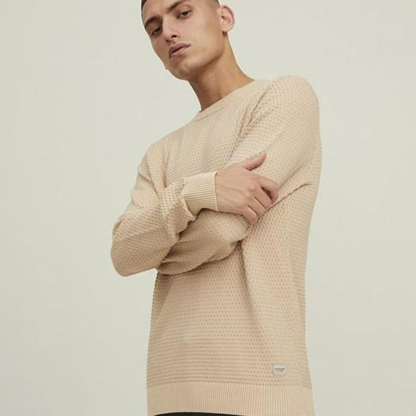 Man wearing a beige sweater on Amazon product page
